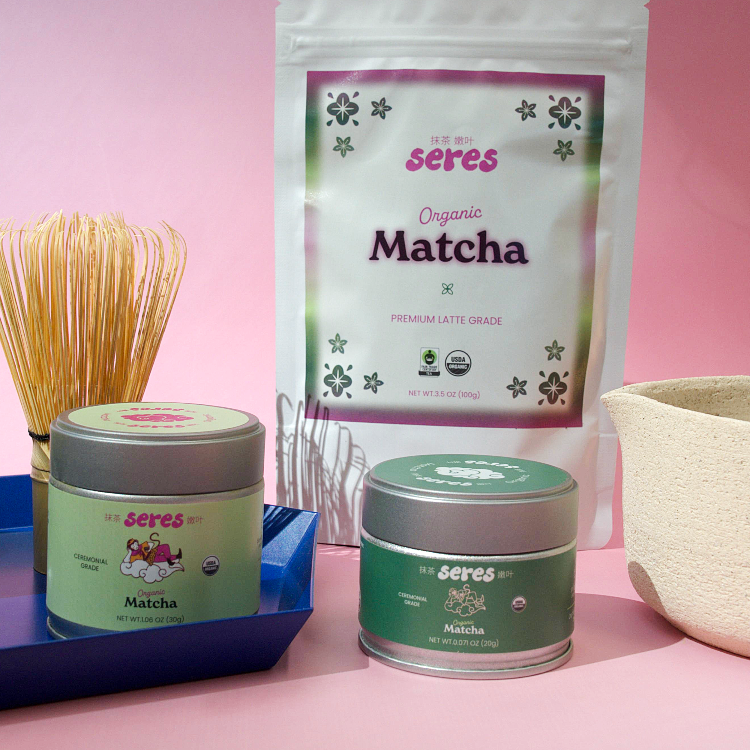 Seres Matcha product collection featuring 100g organic matcha pouch, ceremonial matcha tins, and traditional bamboo whisk.